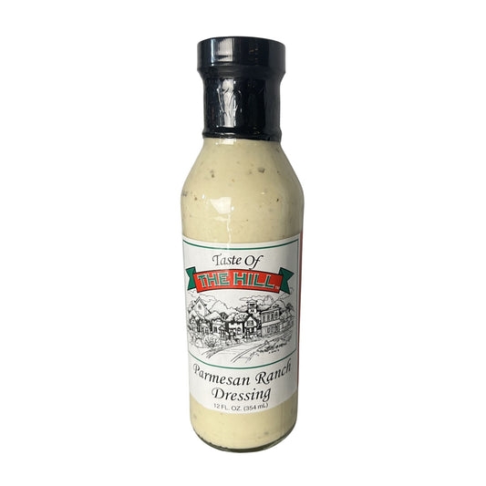Bottle of Parmesan Ranch Dressing with a label on a white background